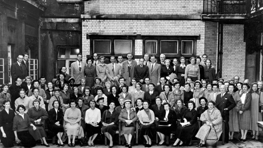 A group of American teachers pose with Queen Elizabeth II of England