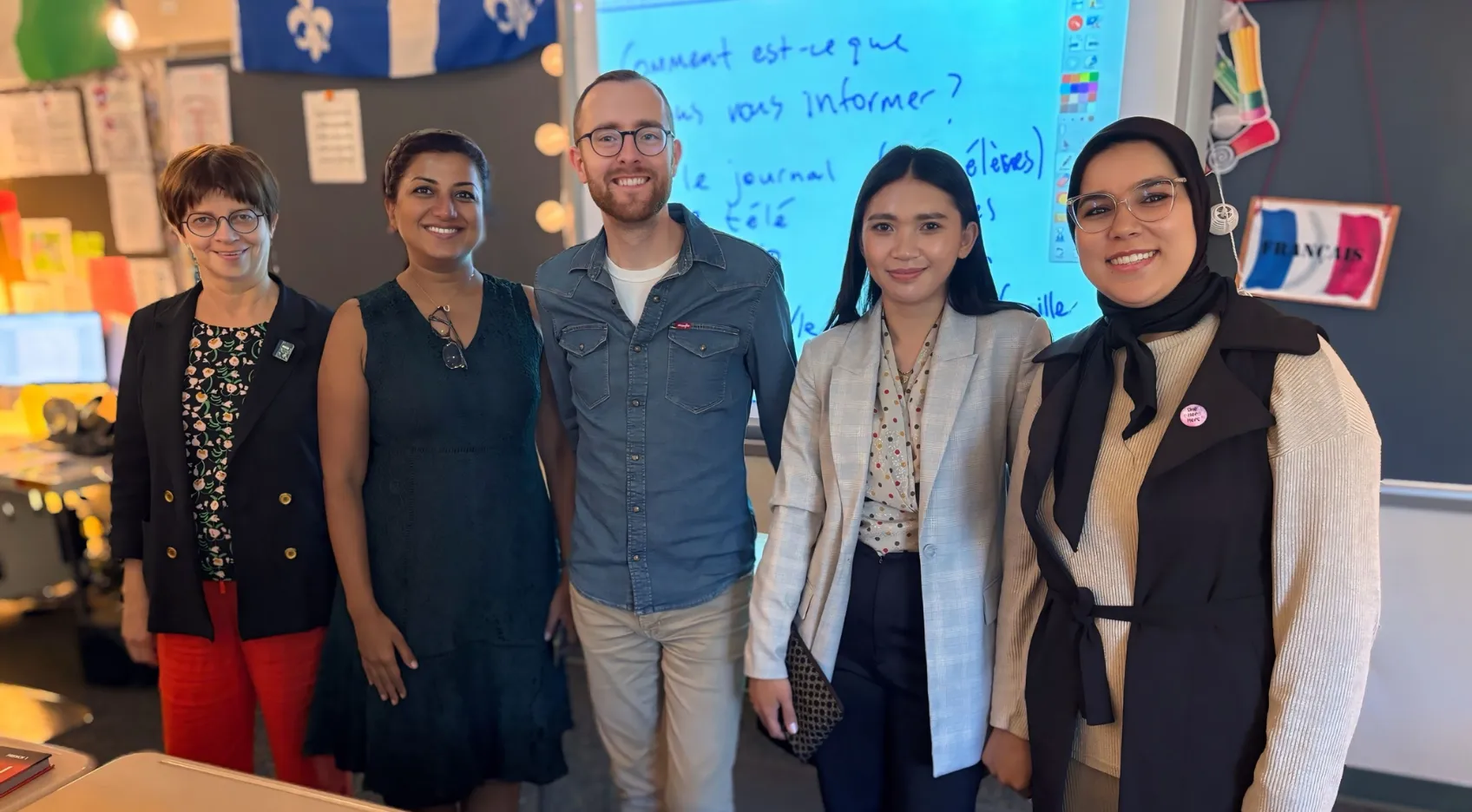 Fulbright Teachers standing in front of a classroom