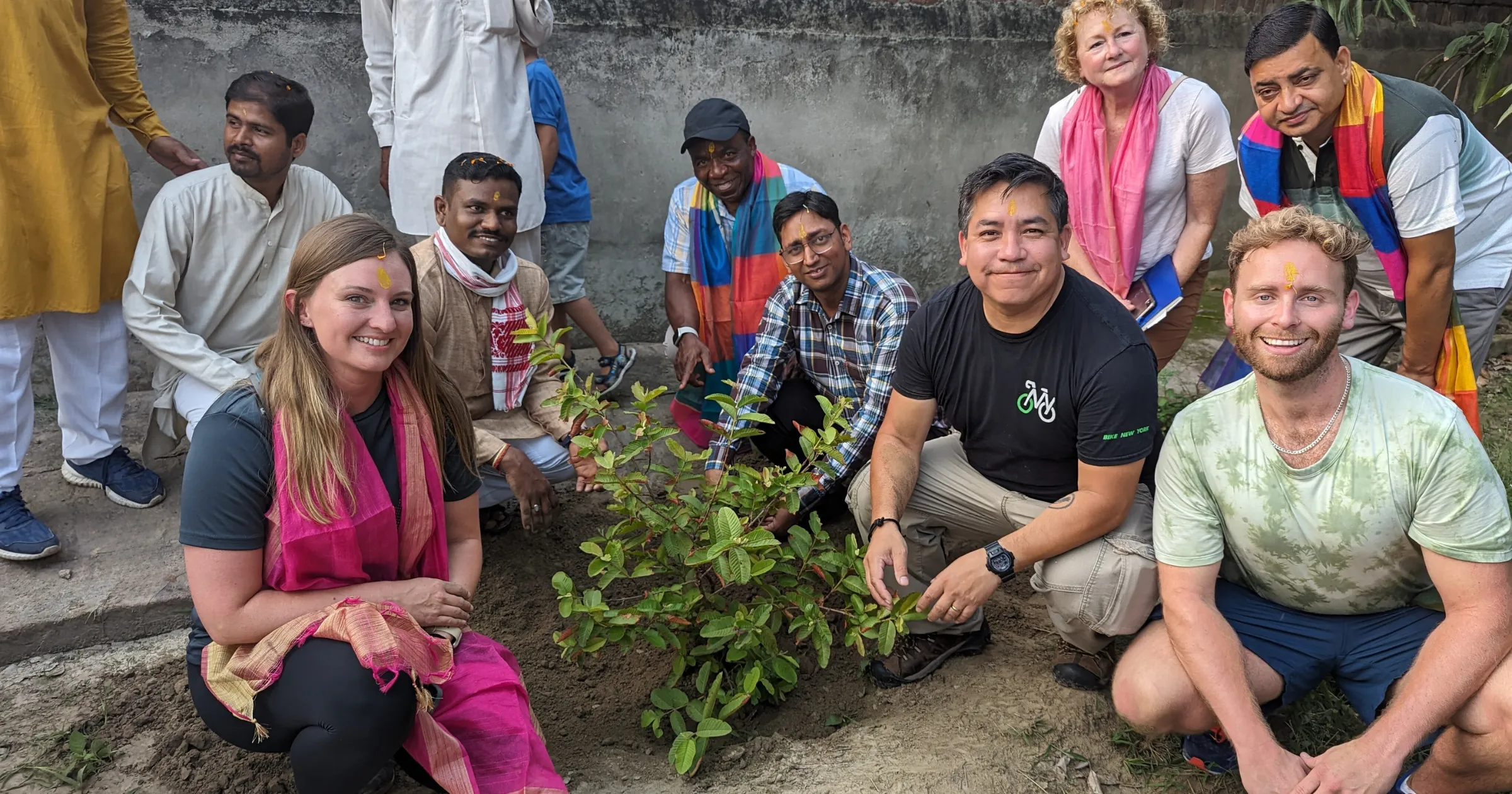 group of U.S. and international teachers at a tree planting ceremony in India