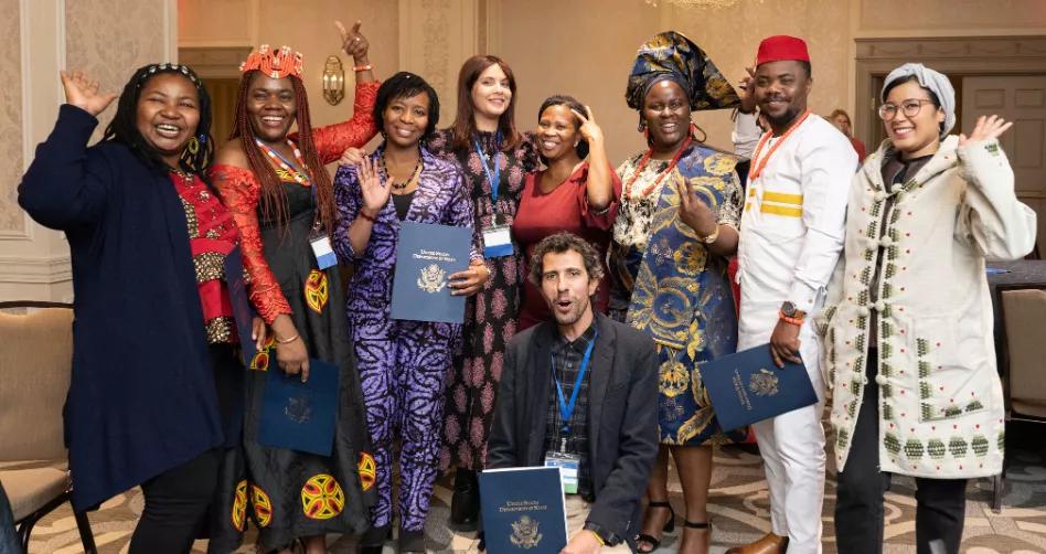 a group of teachers in multicultural clothing