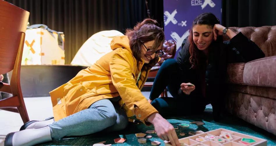 two Fulbright Teachers completing a puzzle in the Netherlands